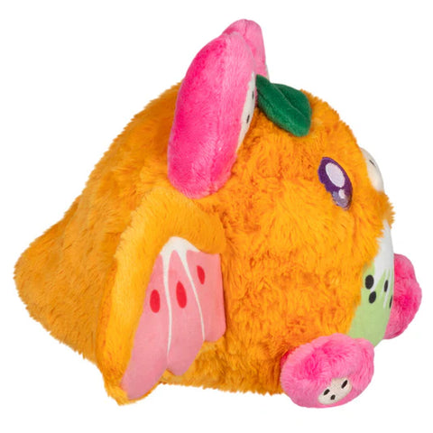 Image shows a side view of the stuffed "fruit bat"