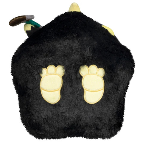 Bottom view of the plush graveyard-themed plague doctor. It has yellow embroidered feet.