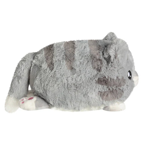 Image shows a side view of the stuffed grey kitty. It is very round.