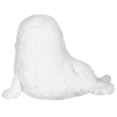 Image shows a side view of the stuffed seal