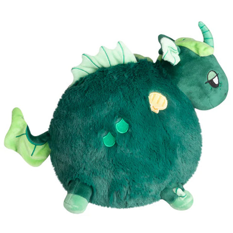 A side view of the plush green kelpie. Its body is very round.
