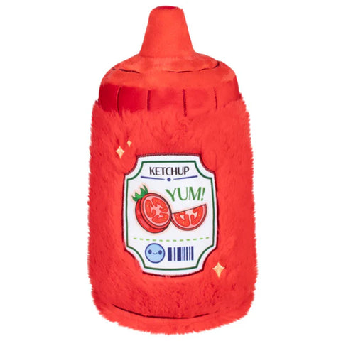 Image shows a back view of the stuffed ketchup bottle. It has a label with sliced tomatoes and a barcode.