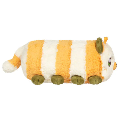 Image shows a side view of the stuffed kittypillar - showing off its long body and cat tail