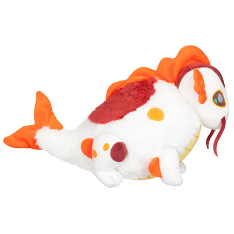 Image shows a side view of the stuffed koi fish dragon. Its body is very round.