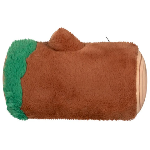 Plush toy shaped like a log with a green top on a white background