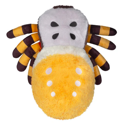 Top view of a Plush spider toy with yellow body and brown legs on a white background