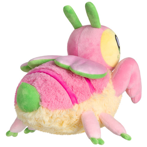 Image shows a back-angle view of the stuffed pastel praying mantis