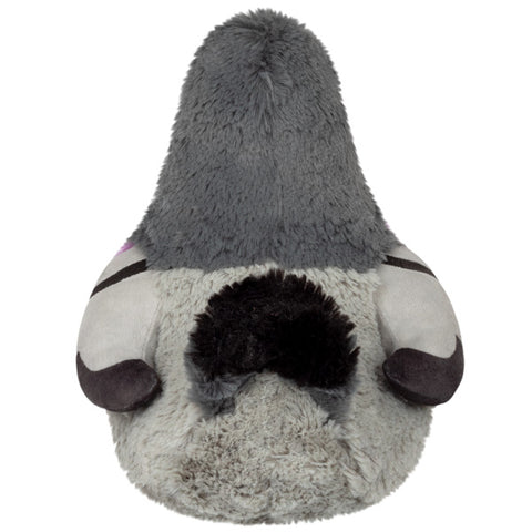 A back view of the plush pigeon