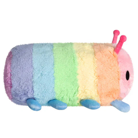 Image shows a side view of the stuffed pastel rainbow caterpillar