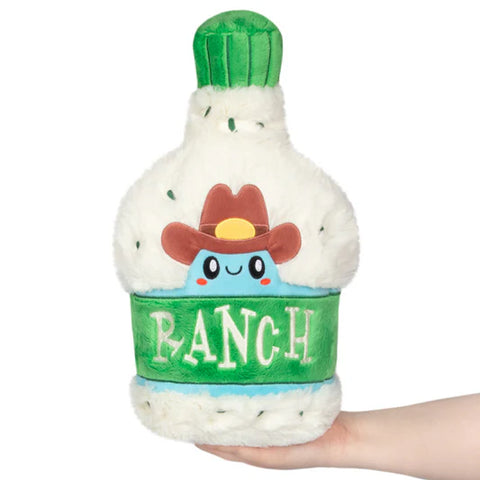 Image shows a stuffed ranch bottle. There is a cowboy character above the ranch label.