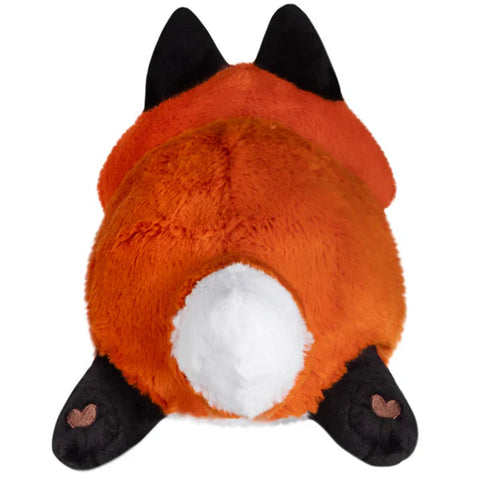Image shows a back view of the stuffed red fox. It has hearts on the bottom of its paws.