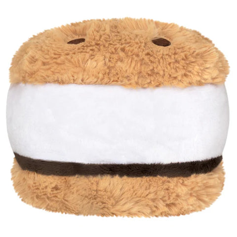 Plush toy resembling a s'more with brown top, white middle, and brown bottom on a white background