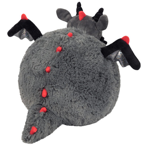 A back view of the plush grey dragon