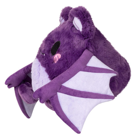 Image shows a side view of the stuffed purple bat