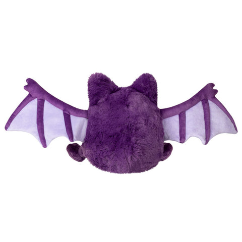Image shows a back view of the stuffed purple bat with its wings out