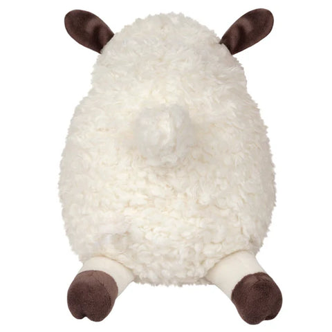 Image shows a back view of the stuffed lamb