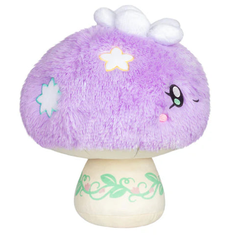 Image shows a side view of the pastel purple mushroom
