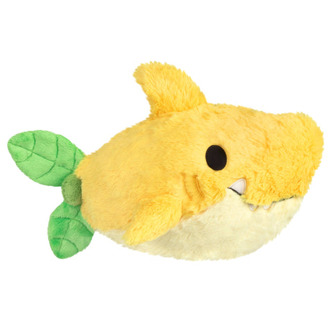 A side view of the plush lemon shark