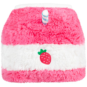 A side view of the plush strawberry milk carton with a strawberry detail
