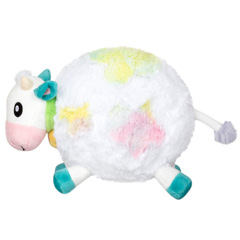 Image shows a side view of a stuffed pastel-colored tie dye cow