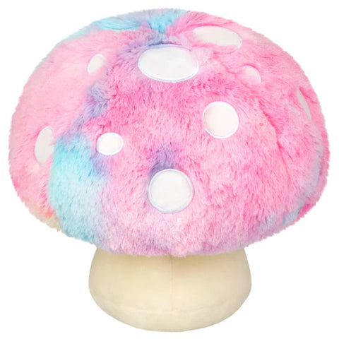 Back view of a Plush toy mushroom with pink and blue pattern on a white background