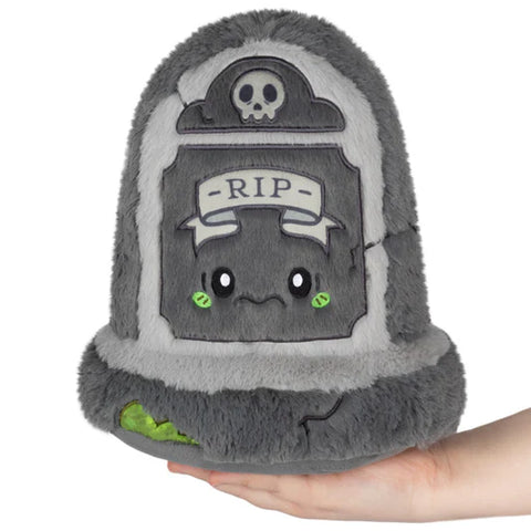 Image shows a stuffed tombstone