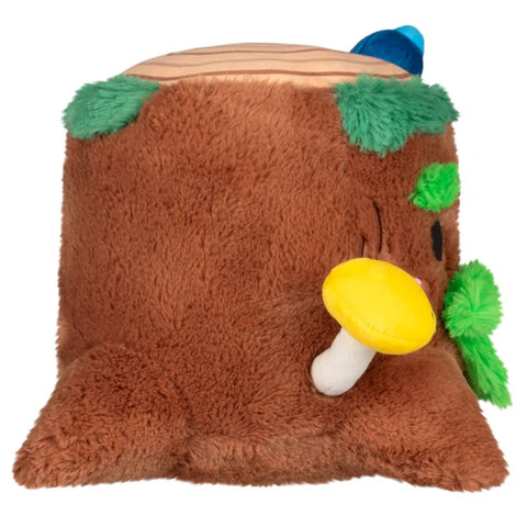 Image shows a side view of the stuffed tree stump