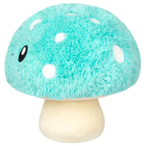 A side view of the plush turquoise mushroom