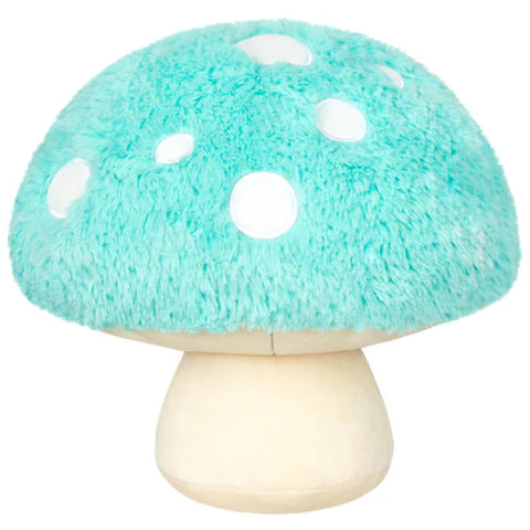 Plush mushroom toy with a turquoise cap and beige stem on a white background