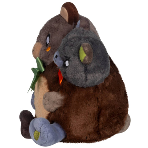 A side view of the plush two-headed bear
