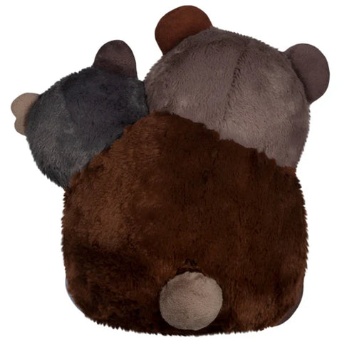 A back view of the plush two-headed bear