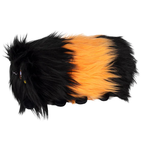 Image shows a side view of the stuffed wooly caterpillar