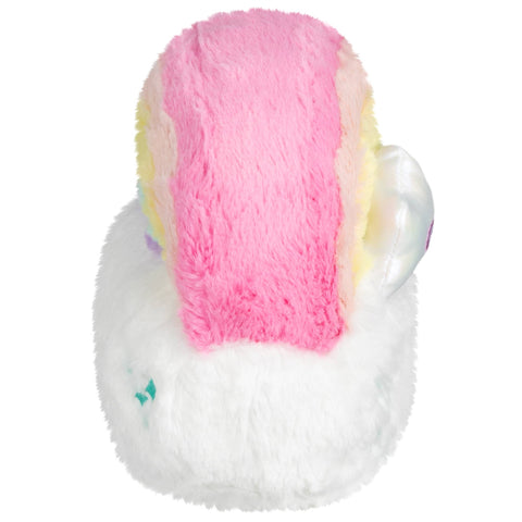 A side view of the plush rainbow toy