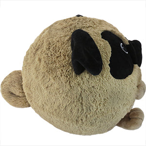 Image shows a side view of the stuffed pug. It is very round.