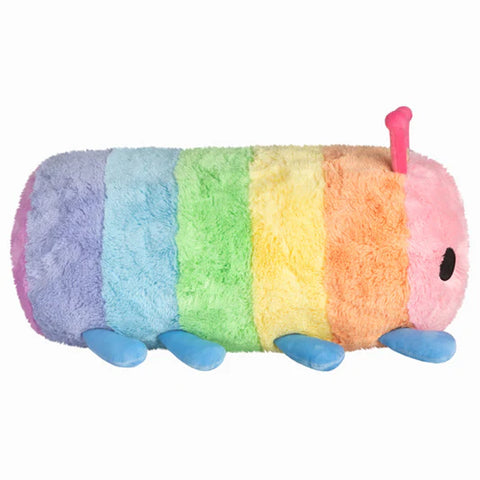 Image shows a side view of the pastel rainbow caterpillar