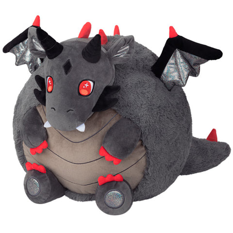 A grey dragon with a round body and red accents.