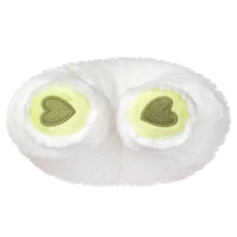 A bottom-up view of the plush white nightcrawler. The bottom of its feet are green with green hearts embroidered.