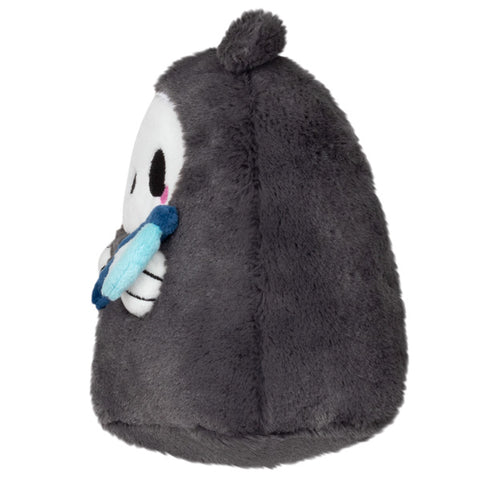 A side view of the plush reaper