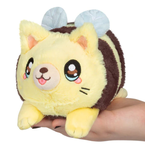 Image shows a stuffed cat bee hybrid. It has the body of a cat, with the stripes and wings of a bee.