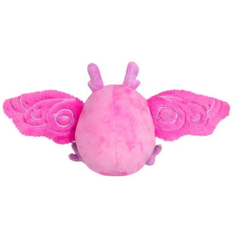 Image shows a back view of the pink stuffed baby Mothman with his wings open