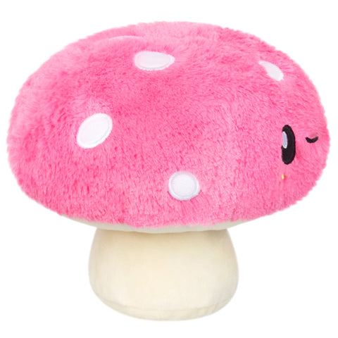 A side view of the plush pink mushroom
