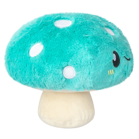 A side view of the plush turquoise mushroom