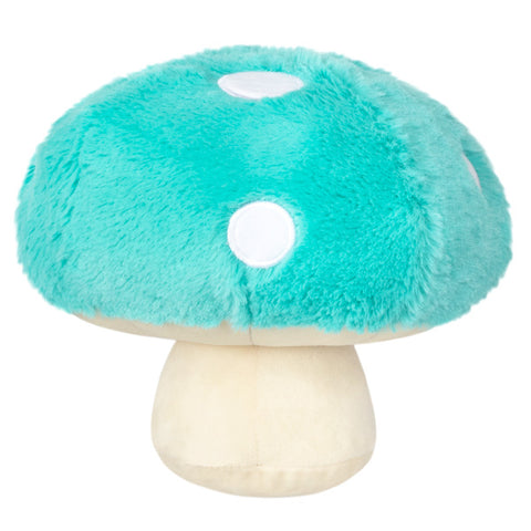 A back view of the plush turquoise mushroom