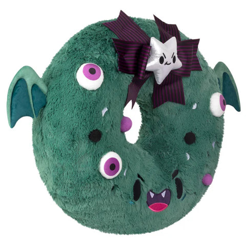 Image shows a side-angle view of the Stuffed spooky wreath