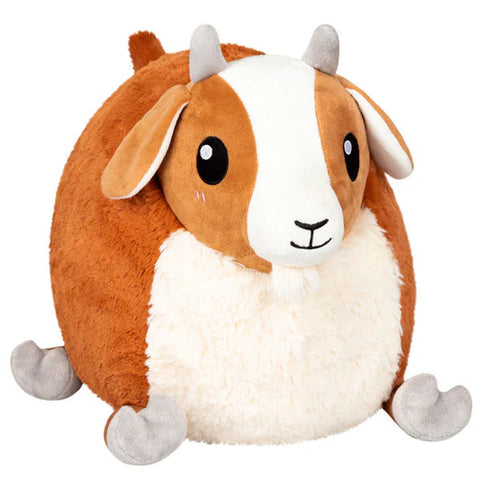 Image shows a stuffed goat. It is very round and has very short legs.