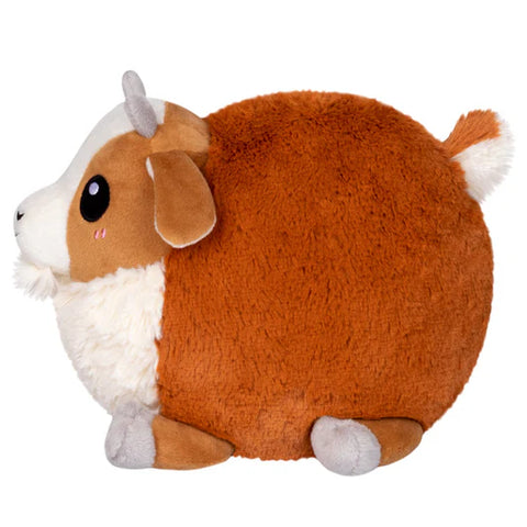 Image shows a side view of the stuffed goat. It shows the roundness of the stuffy.