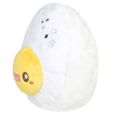 Image shows a side view of the stuffed hard boiled egg