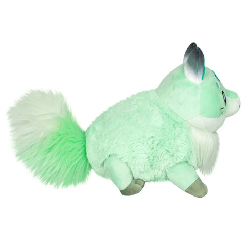Image shows a side view of the stuffed fox, displaying its fluffy tail