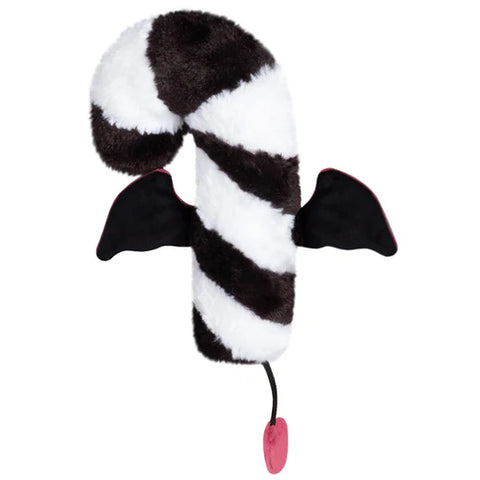 The back view of a black & white candy cane with wings and a tail