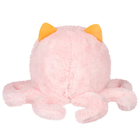Image shows a back view of the stuffed Corgi in an octopus costume